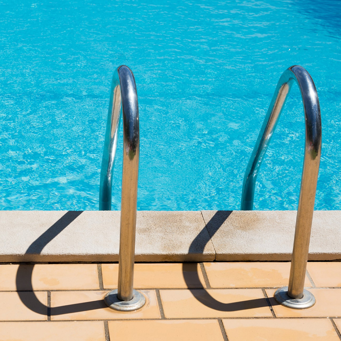 Add important safety features during your next swimming pool remodeling project.